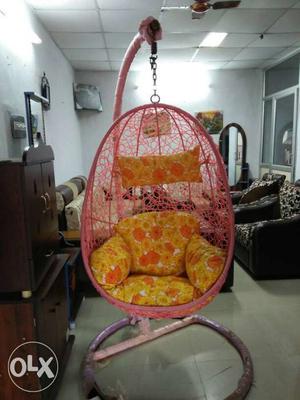 Pink Hanging Chain With Yellow Cushion
