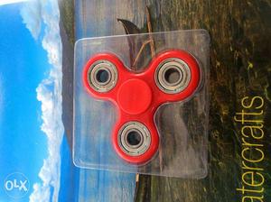 Red Fidget Hand Tri-spinner In Package