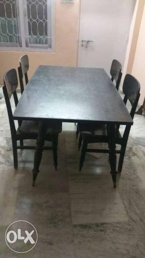 Teak wood dining table with four sitting used for