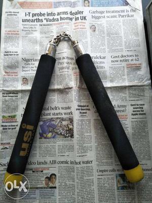 Yellow And Black Nunchucks