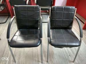 4 cushioned office chairs steel Frame..2