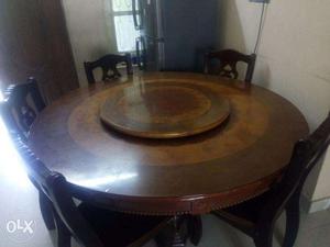 4 year old Round dining table with 5 chairs available
