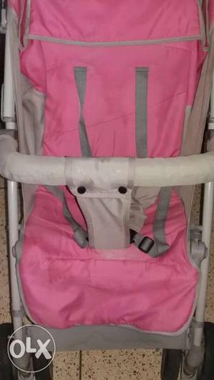 Beautiful grey and pink stroller in v.good condition