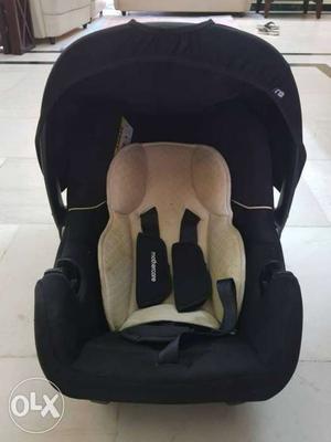 Black And Beige Carrier Seat