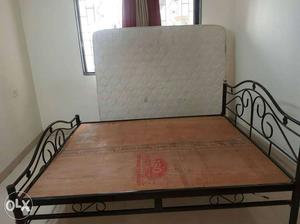 Black Metal Bed Frame; Quilted White Mattress