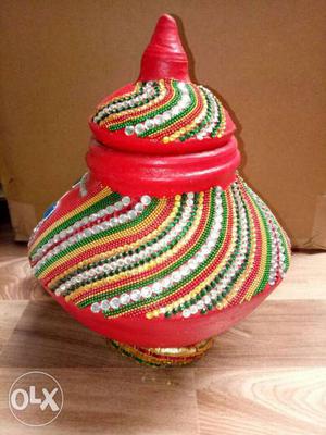 Green, Red, And White Ceramic Urn