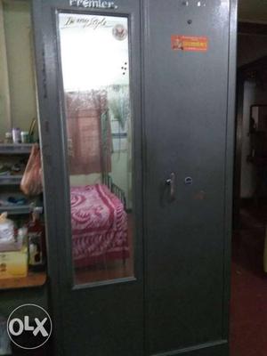 Iron cupboard with mirror..