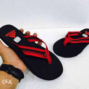 Red-and-black Adidas Flipflops