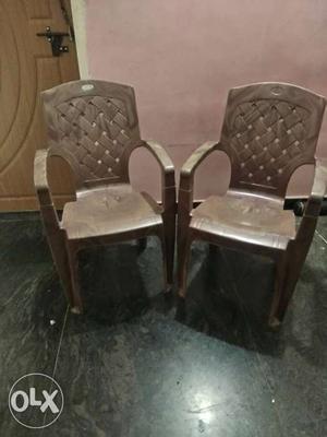 Two Brown Arm Chairs
