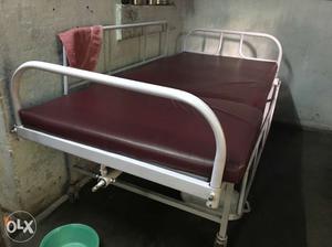 White And Maroon Hospital Bed