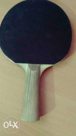Black And Brown Ping Pong Paddle