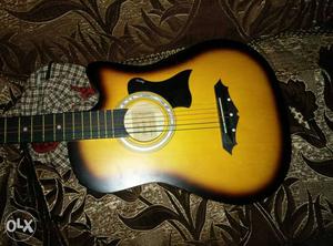 New condition 38" guitar