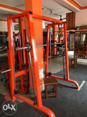 Orange And Silver Barbell Rack