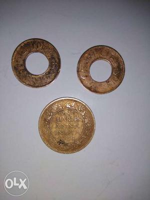 Three Gold Round Coins