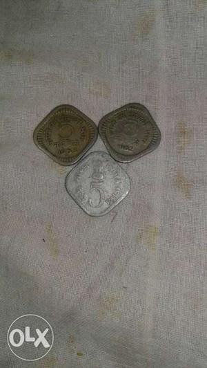 Two bronze and one silver five paise cions
