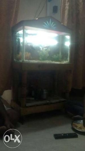 White And Brown Wooden Framed Fish Tank