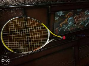 Yellow White And Red Tennis Racket