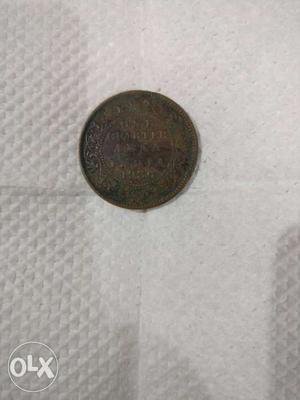 's one quarter Anna. Indian old currency