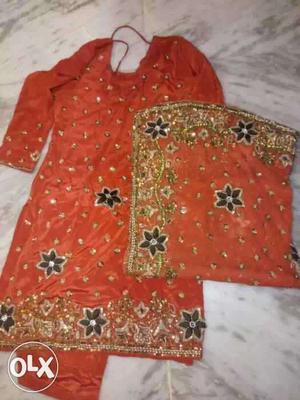 Beautiful copper color heavy work salwar suit n