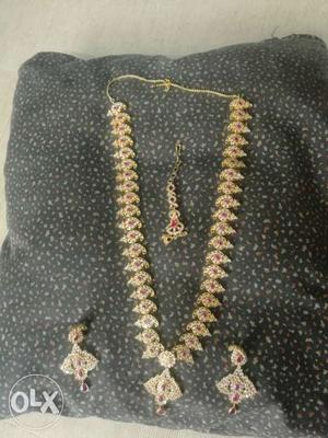It's one time used silver necklace with 1gm gold coated..