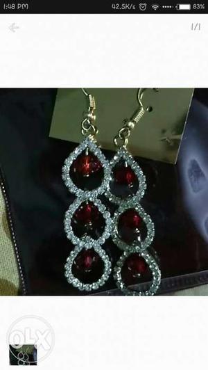 Pair Of Silver Ruby Earrings