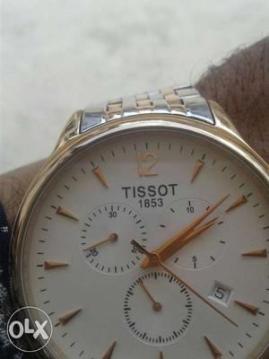 Round White Tissot Chronograph Watch With Silver Link