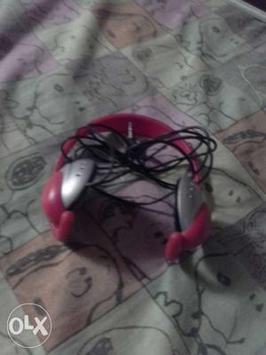 Silver And Pink Corded Headphone