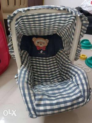 Baby's Blue, Grey, And White Plaid Carrier Car Seat