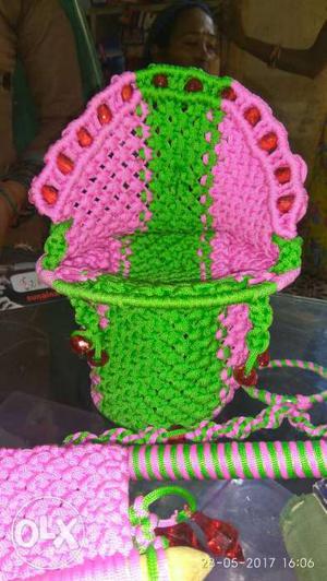 Baby's Green And Pink Knitted Carrier