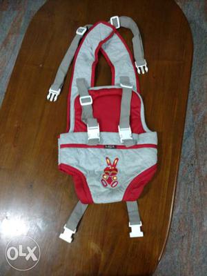 Baby's Grey And Red Carrier