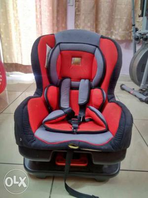 Baby's Red And Black Car Seat Booster