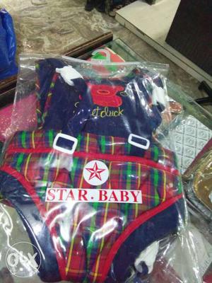 Baby's Red And Blue Carrier In Plastic Pack