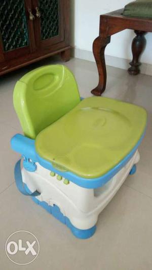 Baby's White And Green Booster Seat