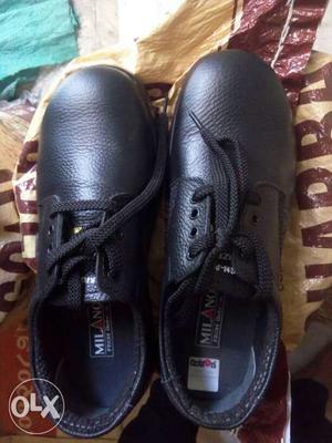 Pair Of Black Leather action Shoes