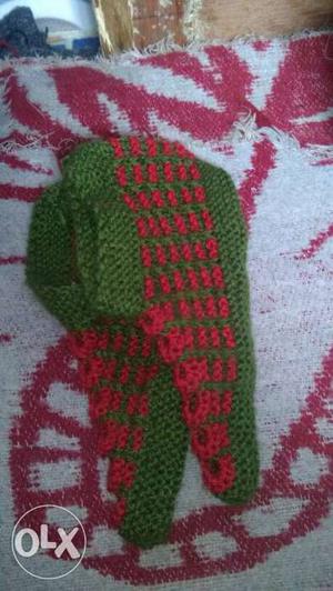 Pair Of Green-and-red Knitted Socks