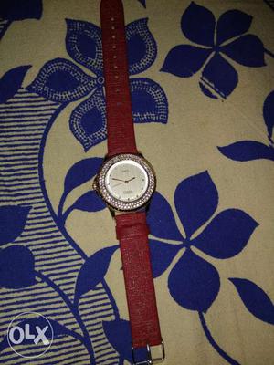 Red colour watch in good condition
