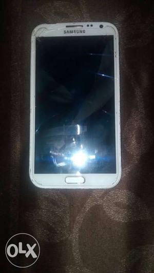 Samsung Note 2 in good condition. Screen krack.