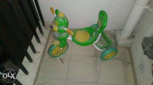 Toddler's Green, White, Yellow Trikes