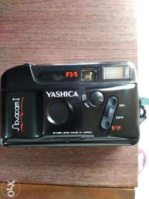 Yashica camera with cover in working condition