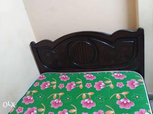 4 by 6 wooden bed with sleeping matress