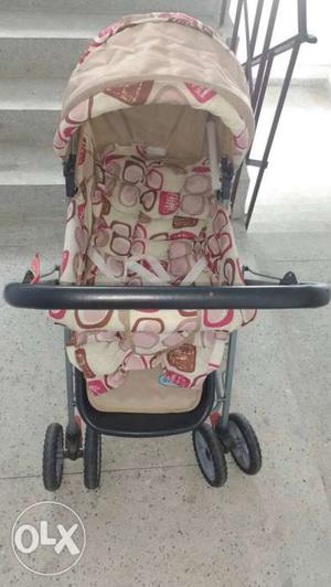 BabyHug Stroller Crem & pink colour