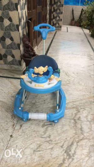 Baby's White And Blue Push Walker