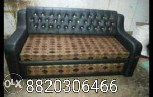 Brown And Black Tufted Back Couch