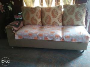 Brown, Gray, And Orange 3-seat Couch