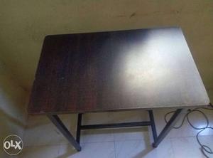 Brown Wooden Dining Table