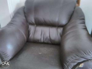 Brown color. 5 seated sofa. Softened with