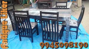 Designer Dining table with quality cushions 6 chairs.