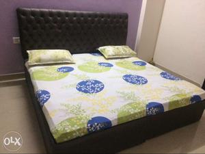 Double bed with mattress and two pillow in good