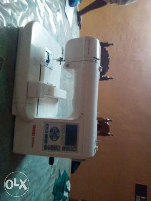 Embroyidary machine with automatic before 1 year,