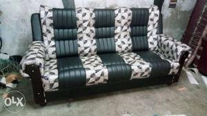 Gray And Black Leather Padded Sofa